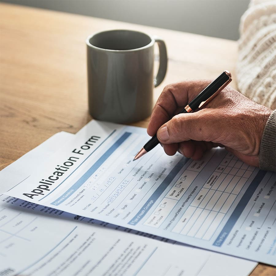A person completes an application